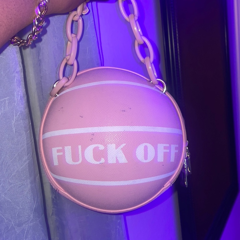 A “fuck off pink basketball handbag”